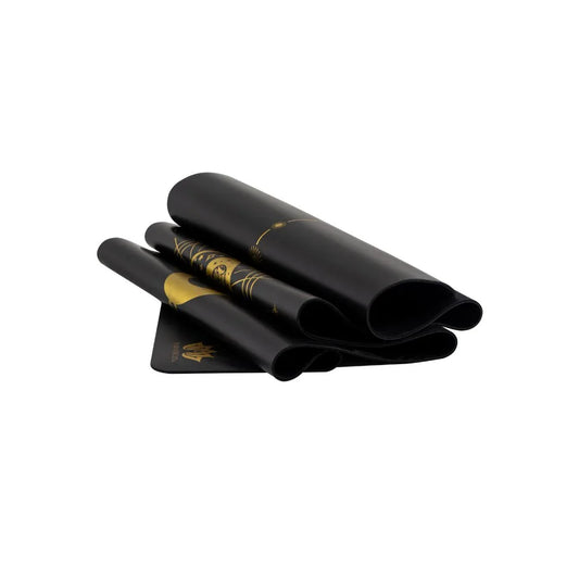 esterilla de yoga antideslizante premium diseño energia negro plegada con tinta dorada