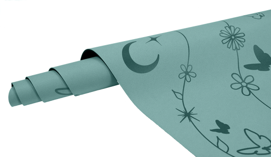 detalle del diseño de la esterilla de yoga antideslizante premium cabeza llena de sueños turquesa con grabado láser